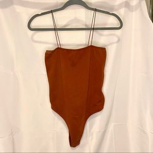PACSun Basics Rust Orange Ribbed Stretch Bodysuit Size L Fall Minimal Sleek